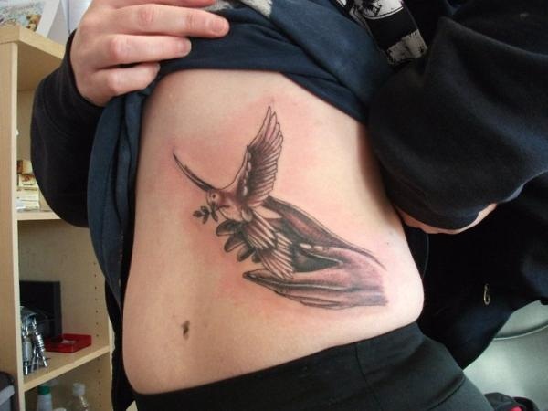 50 belles conceptions de tatouage d'oiseau pour aller avec