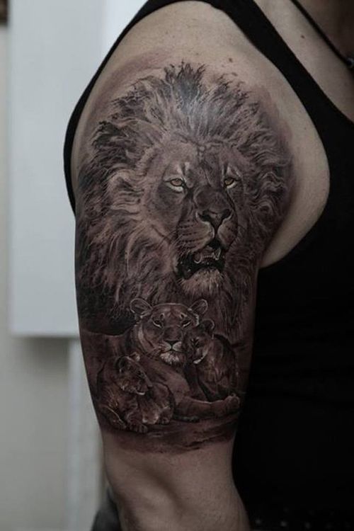 30 meilleures conceptions et significations du tatouage de lion et de chiot avec des images