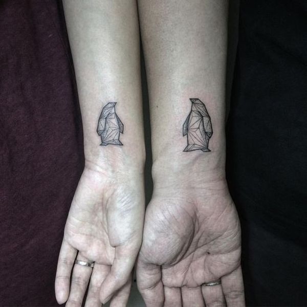 Conceptions et significations de tatouage de pingouin